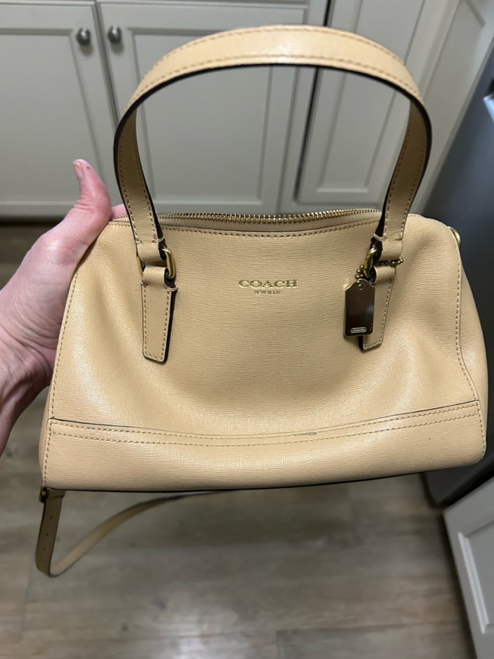 Coach Beige purse. Used once. 10x4x6.5 inches. 47 inch adj strap. Very clean!!